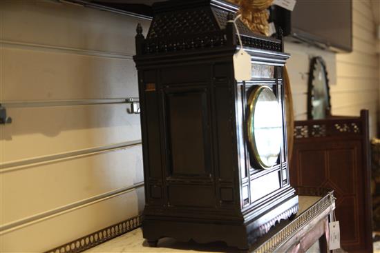An Aesthetic movement ebonised architectural mantel clock, c.1885, height 20in.